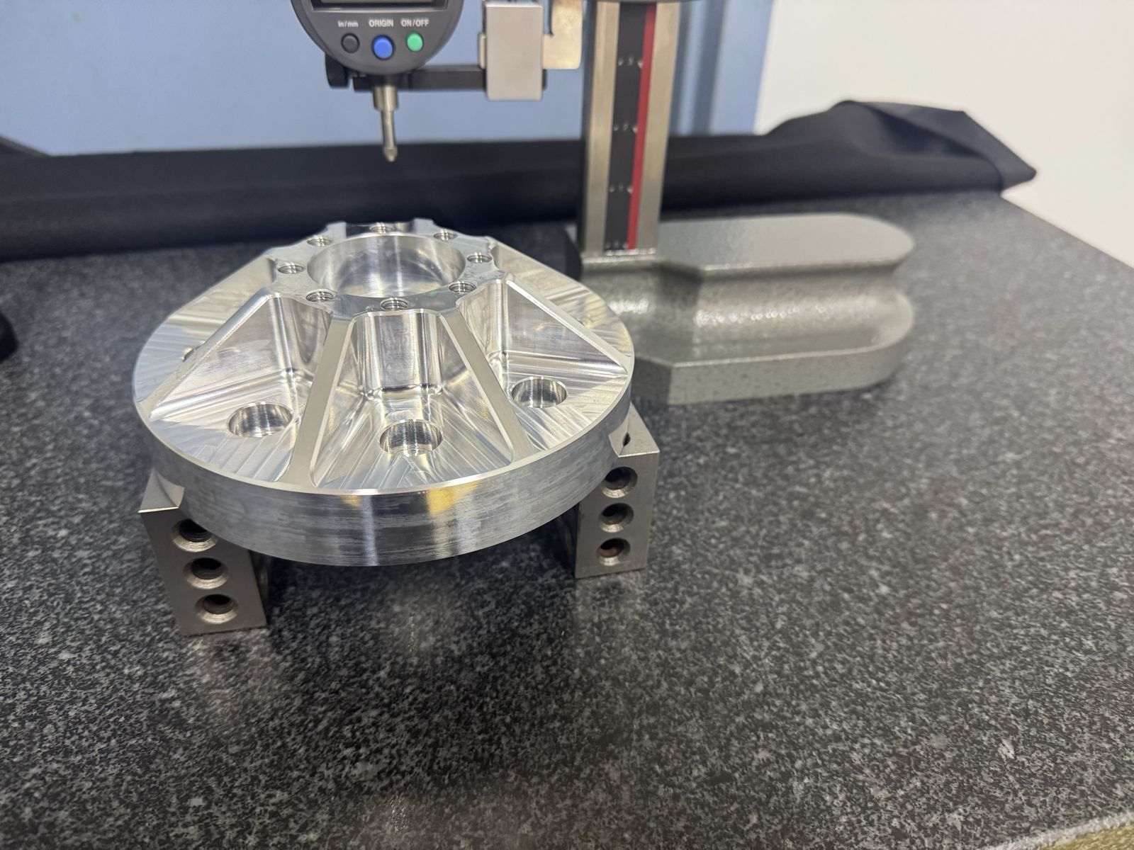 Height gauge check on a machined housing