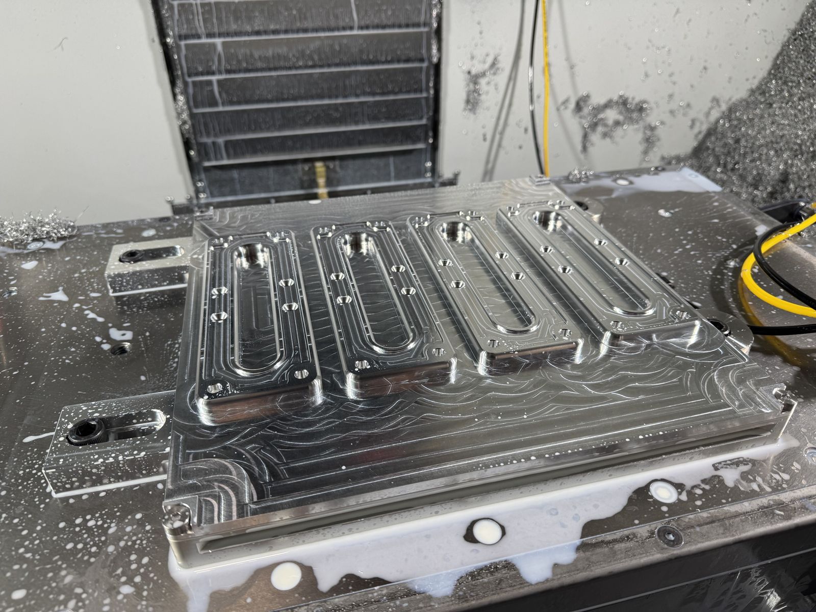 Machined aluminum plate with pockets