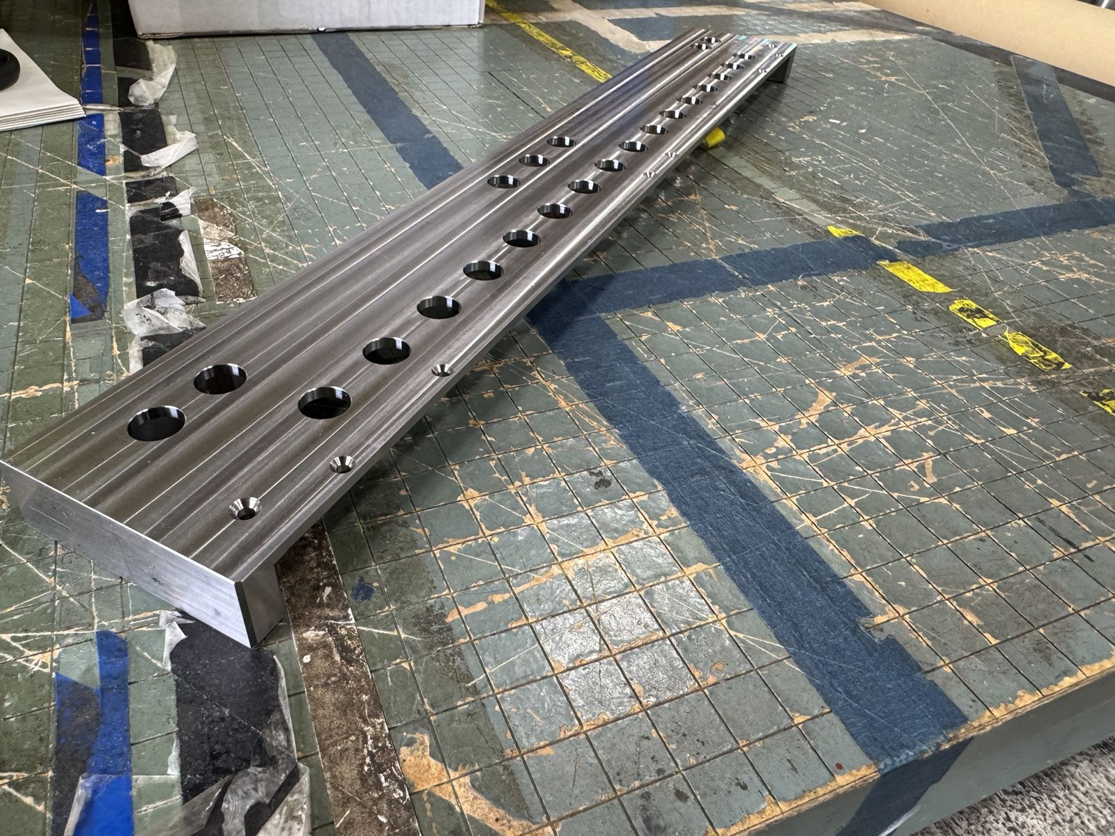 Machined steel rail